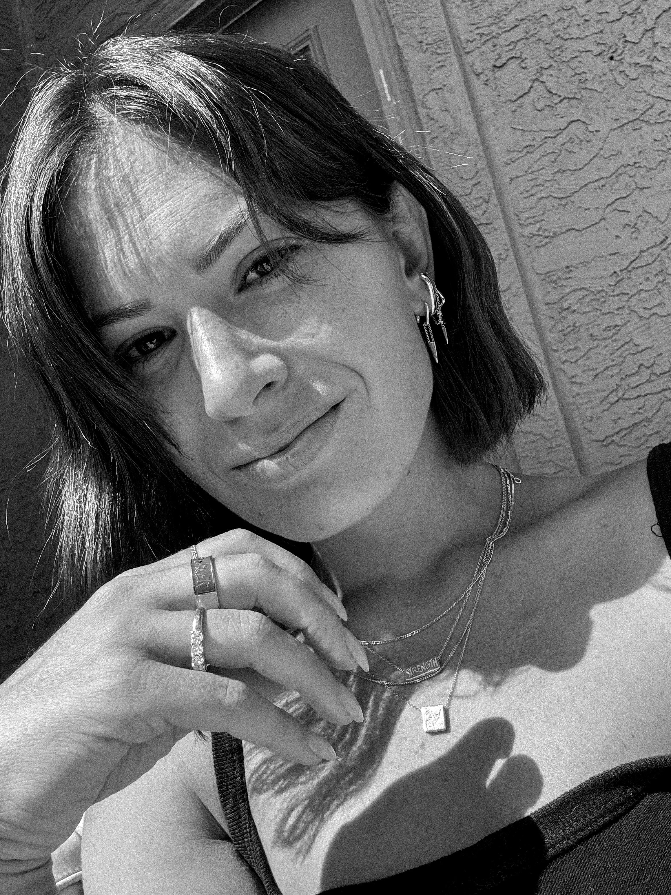 Selfie image of Roksanna Hulyk, founder of Nadiya the jewelry brand.