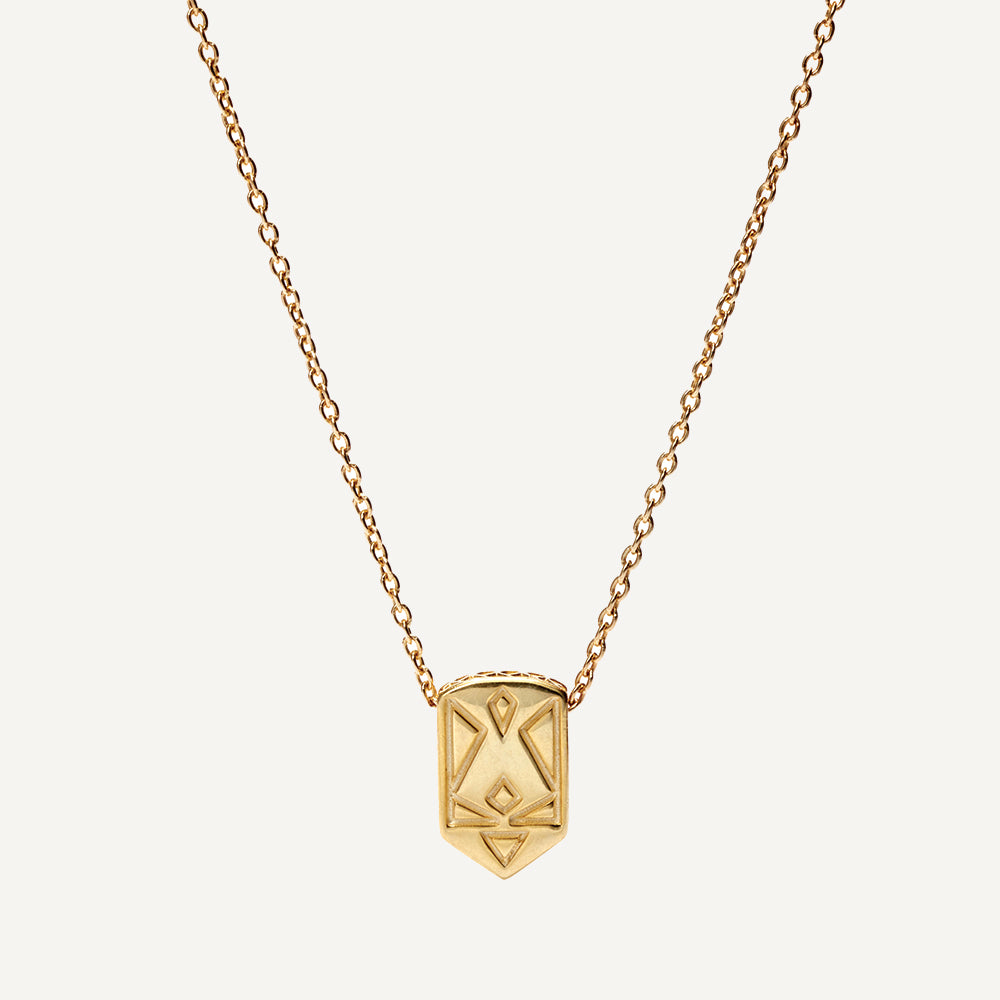 Image alt text: Affirmation Necklaces in 10K solid gold, featuring hidden pattern inspired by Ukrainian embroidery. Versatile and meaningful, perfect for solo wear or layering. Every purchase supports a cause