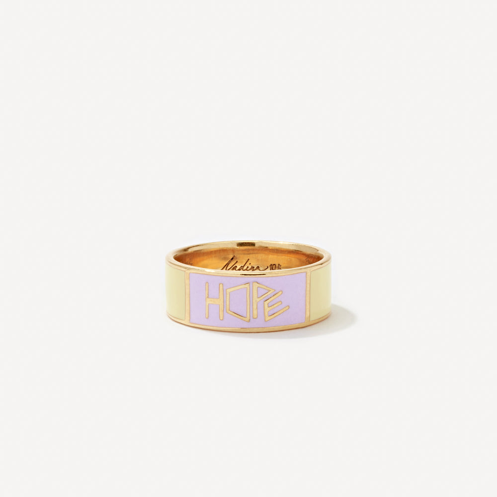 Image of 10k Solid Gold Affirmation Cigar Rings stacked with colorful enamel designs, representing affirmations. A bold and unique addition to your jewelry collection. Support a cause of your choice with each purchase, seamlessly blending style, positivity, and purpose.