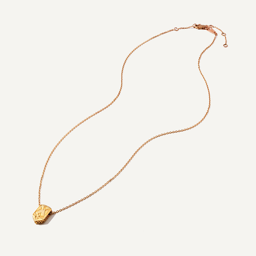 Image alt text: Affirmation Necklaces in 10K solid gold, featuring hidden pattern inspired by Ukrainian embroidery. Versatile and meaningful, perfect for solo wear or layering. Every purchase supports a cause