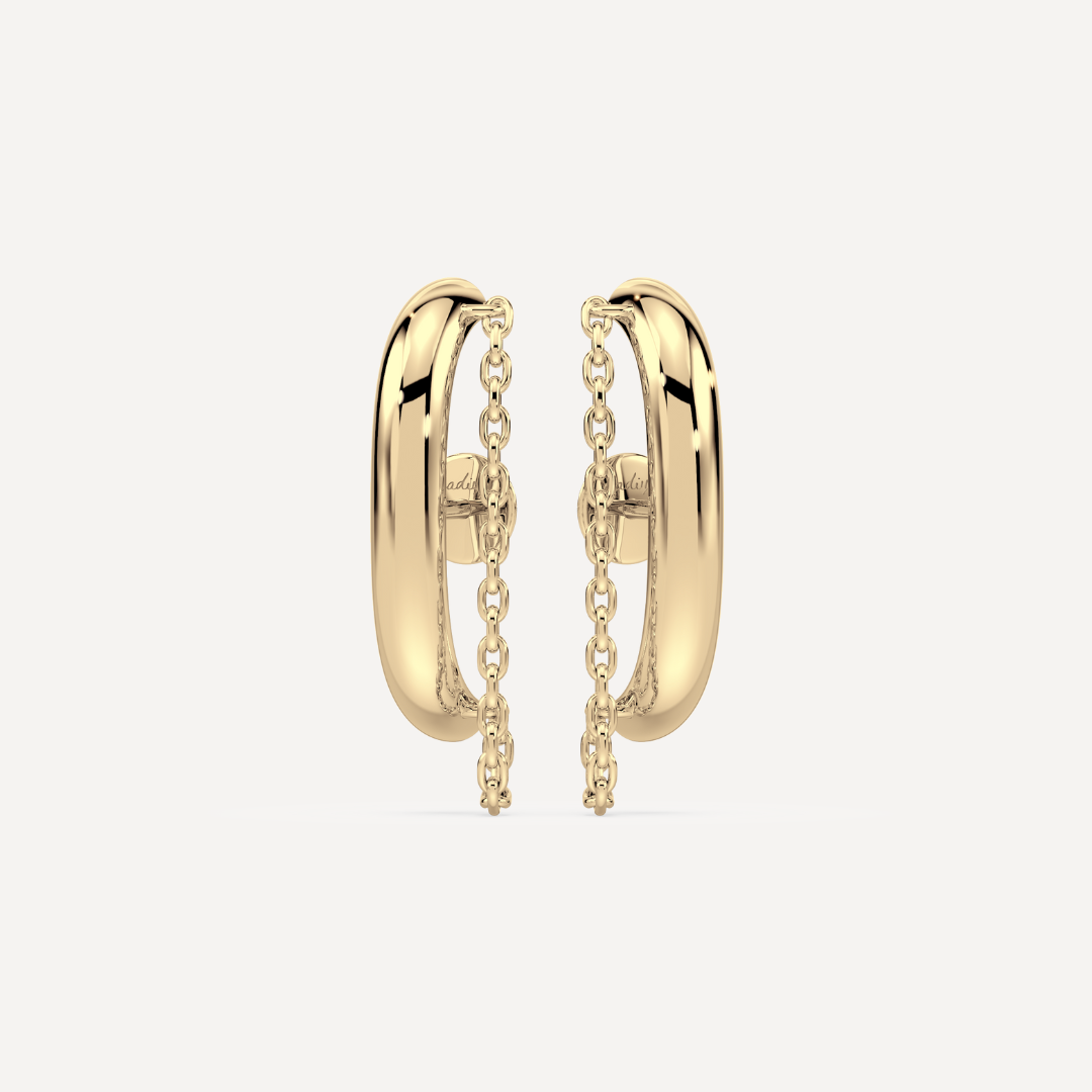 Solid gold ear suspender earrings with chain detail by Nadiya Jewelry on a white background