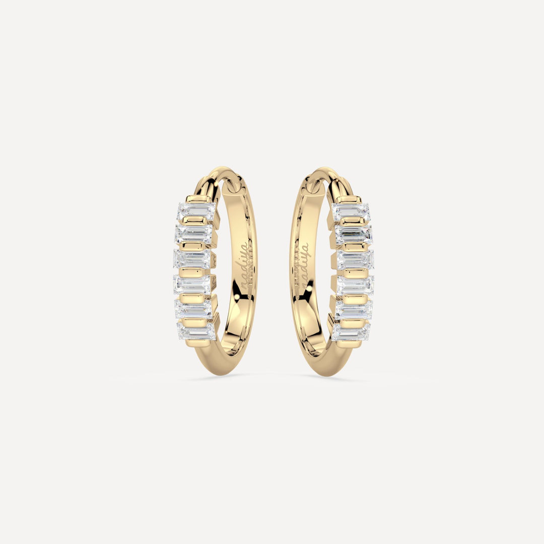 solid gold hoops with baguette diamonds by nadiya jewelry
