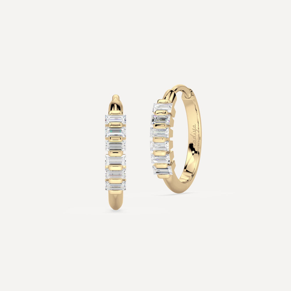 solid gold hoops with baguette diamonds by nadiya jewelry
