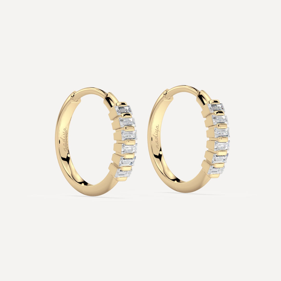solid gold hoops with baguette diamonds by nadiya jewelry