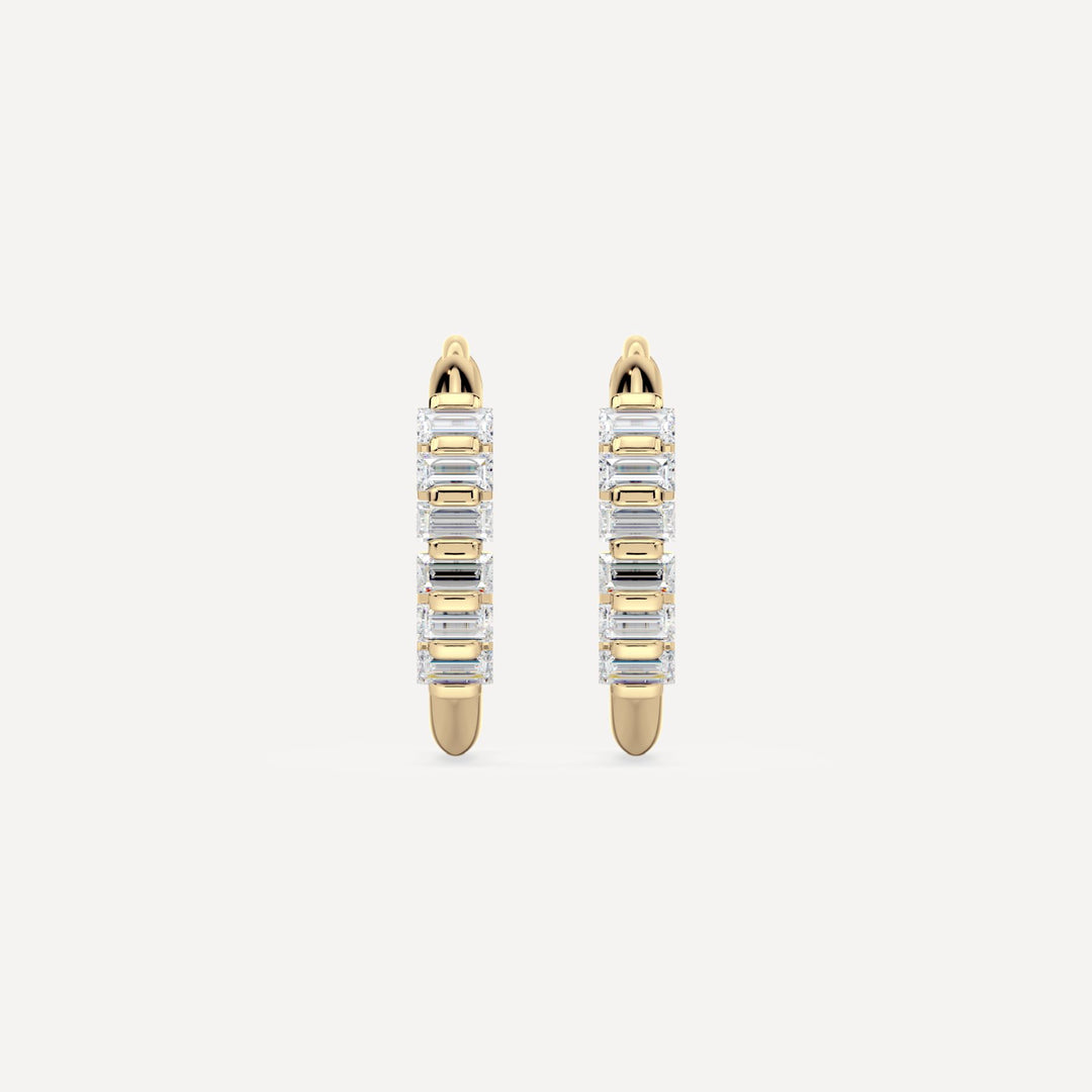 solid gold hoops with baguette diamonds by nadiya jewelry