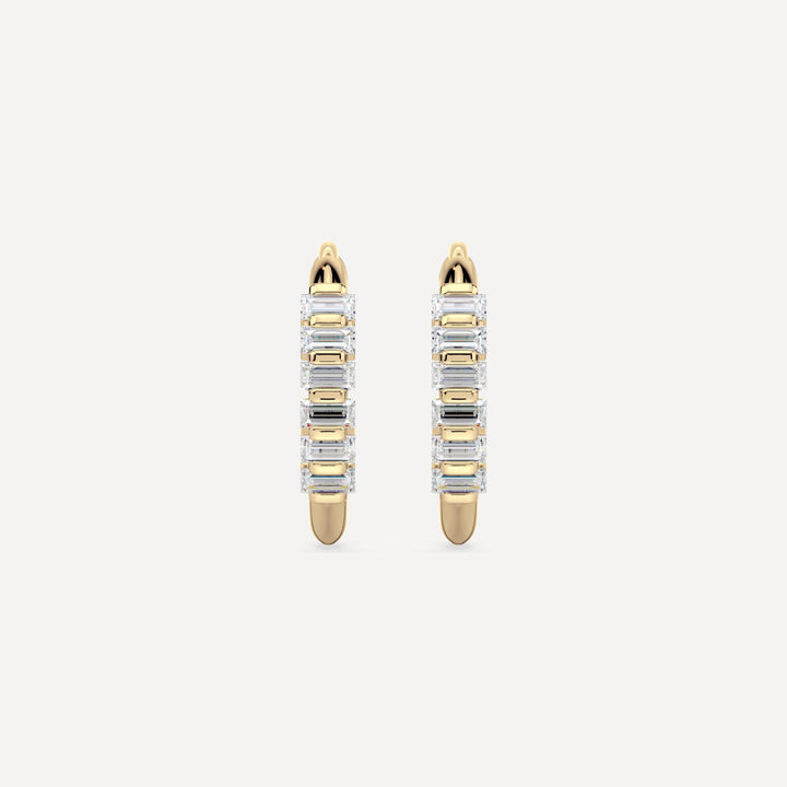 solid gold hoops with baguette diamonds by nadiya jewelry