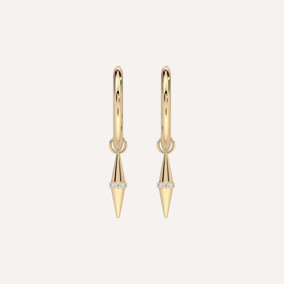 solid gold hoops with solid gold hoop charms and diamonds in a cone shape on white background by nadiya jewelry