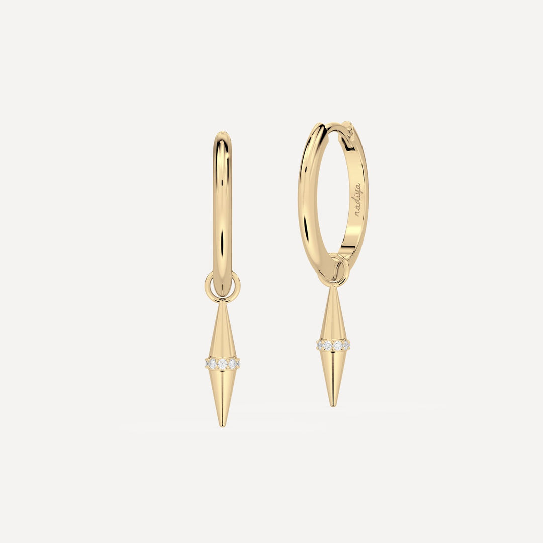 solid gold hoops with solid gold hoop charms and diamonds in a cone shape on white background by nadiya jewelry