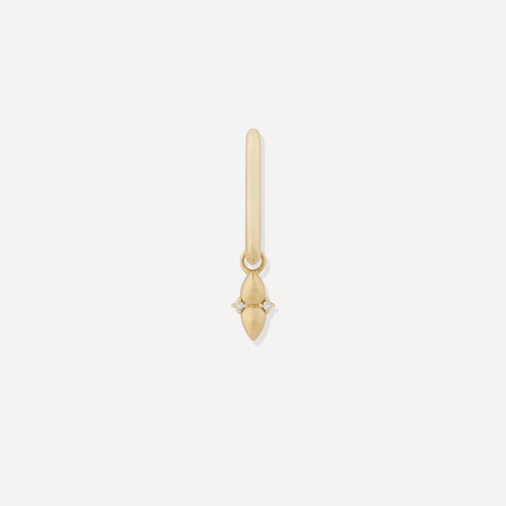A single gold-colored hoop charm with a central stone surrounded by smaller clear stones set in a gold-tone frame, designed for use as an earring.