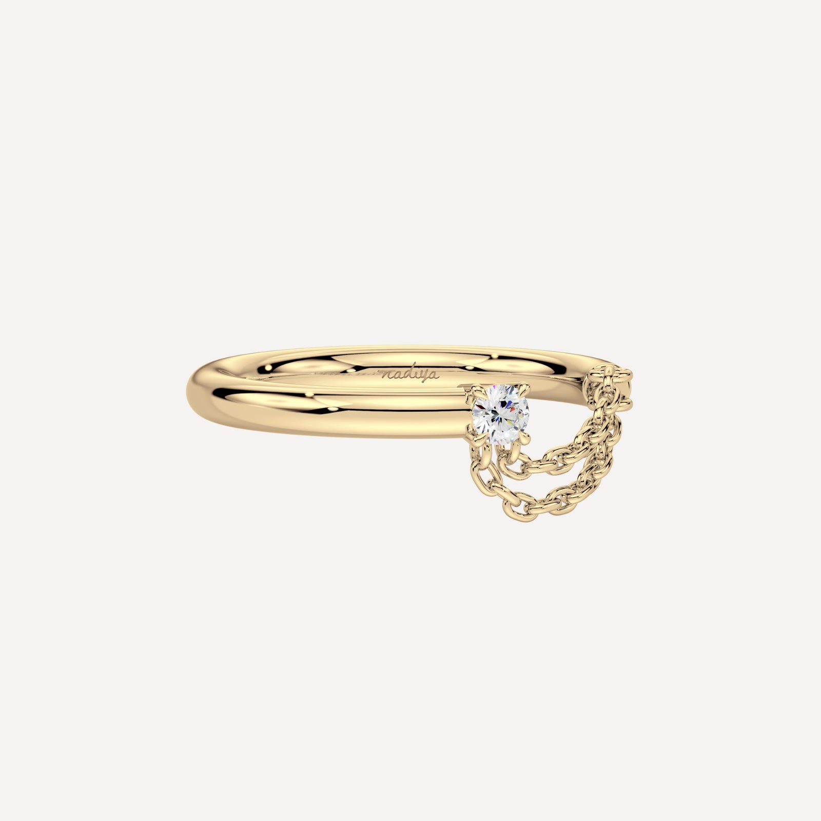 Solid gold ring with a diamond and chain retailing by nadiya jewelry 