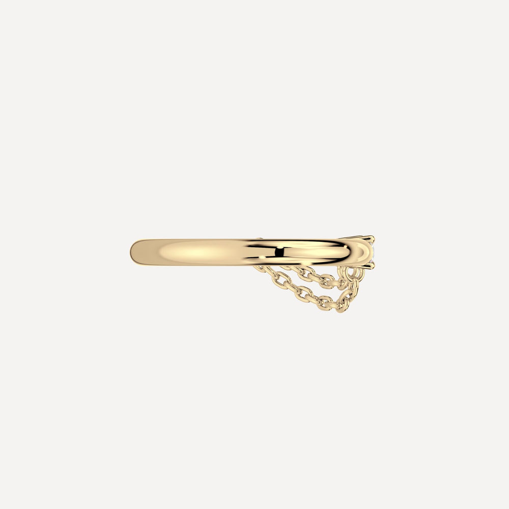 Solid gold ring with a diamond and chain retailing by nadiya jewelry 